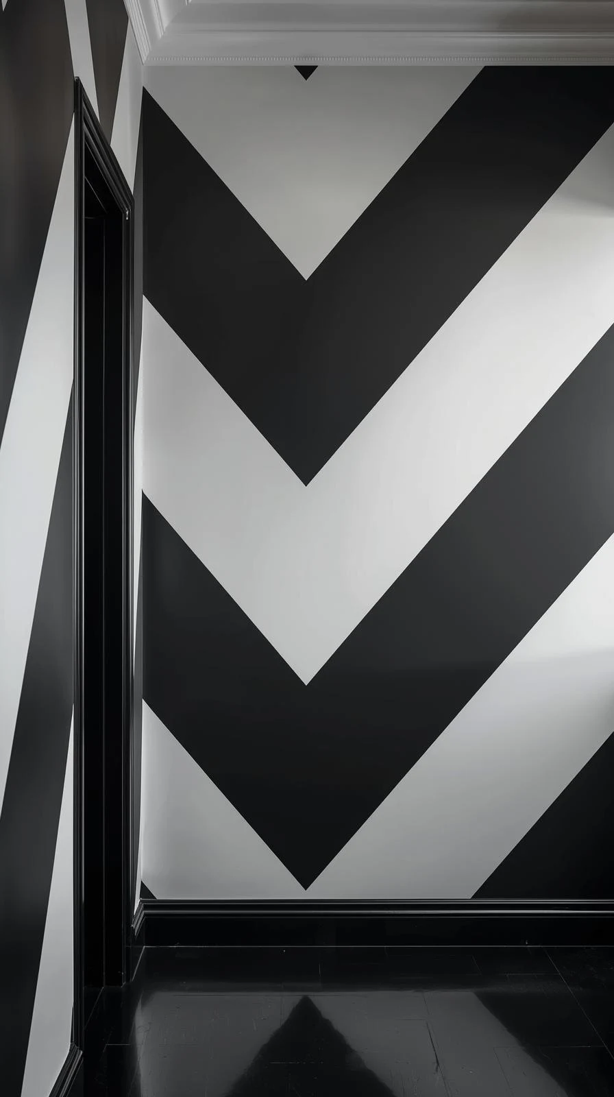 Une tapisserie d'entrée à fort contraste avec un motif de chevrons géants noirs et blancs audacieux.